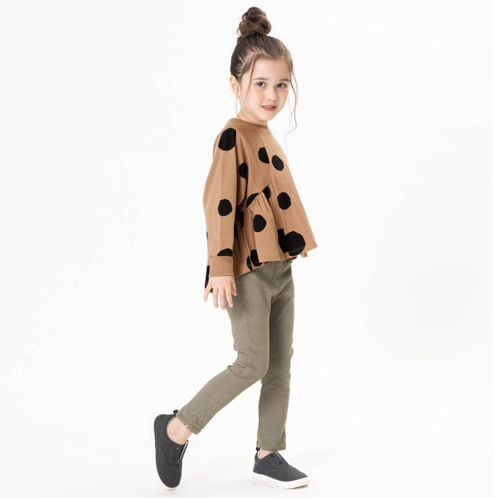 Deformed cut and sew top